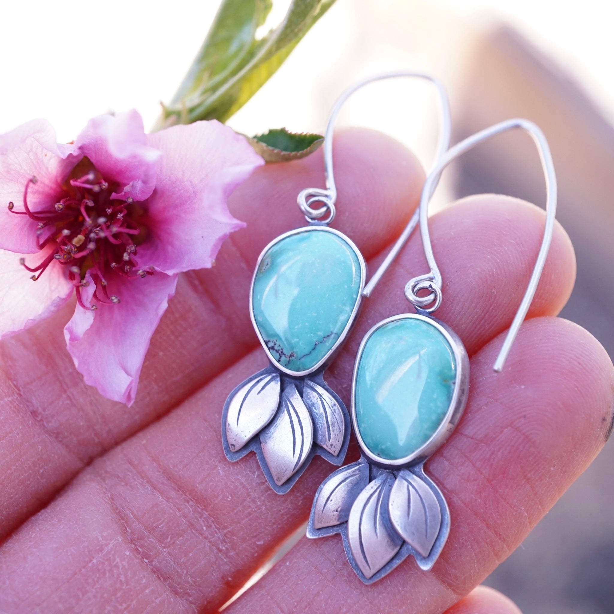 turquoise dangle earrings with silver flower petals