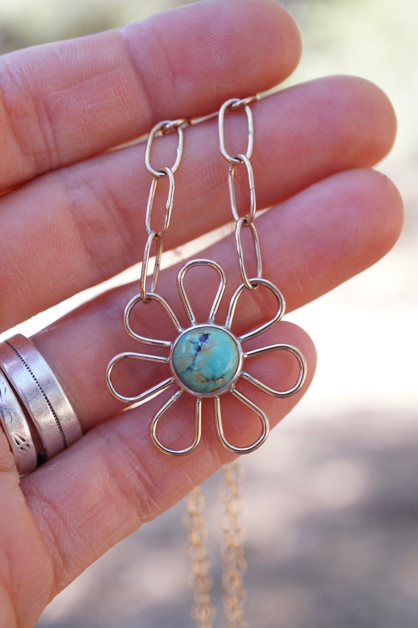 flower child necklace in 14k goldfill with blackjack turquoise