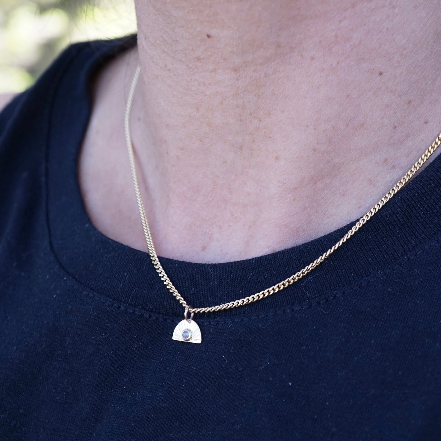 14k golden sunrise necklace with diamond