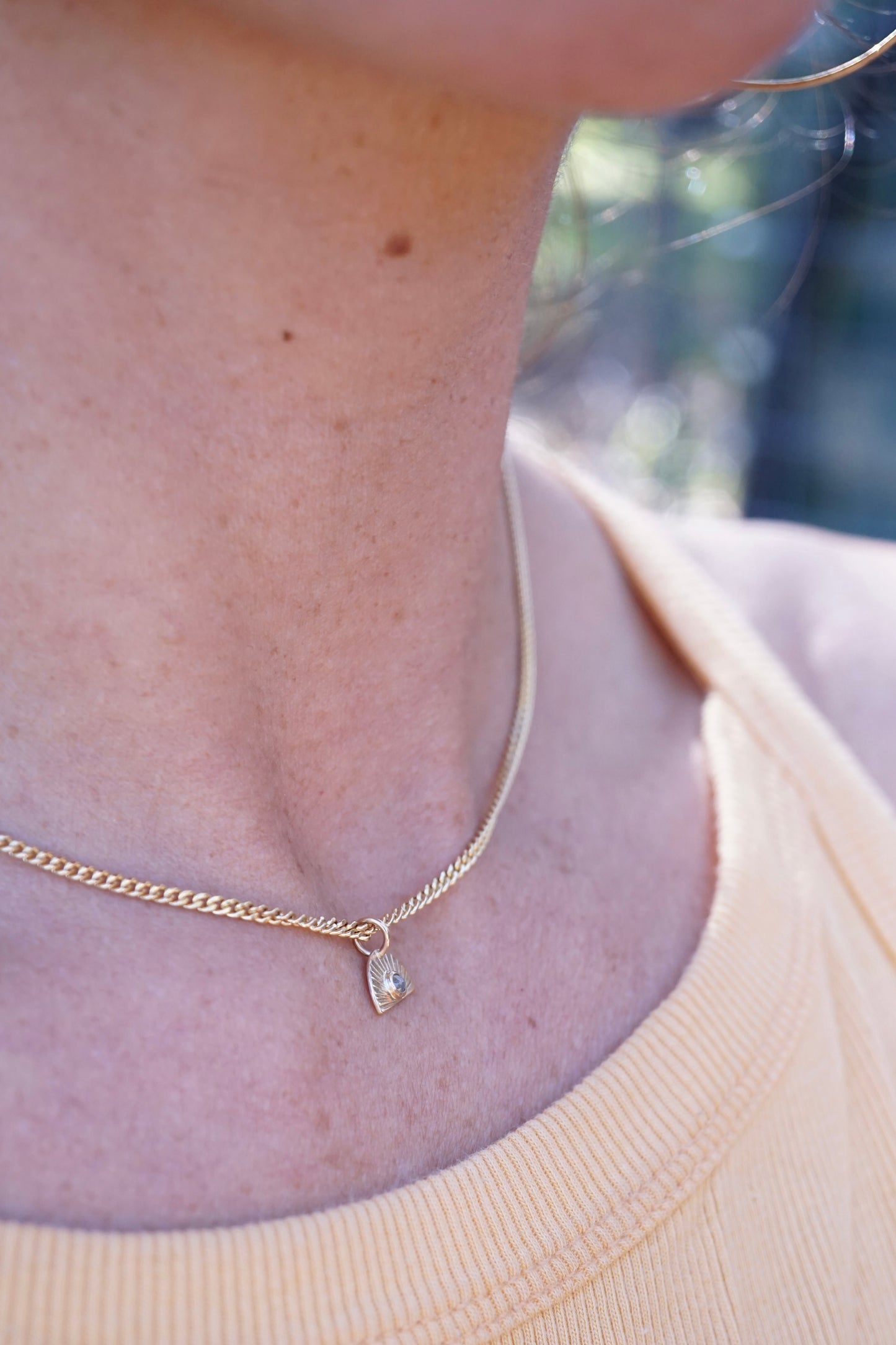14k golden sunrise necklace with diamond