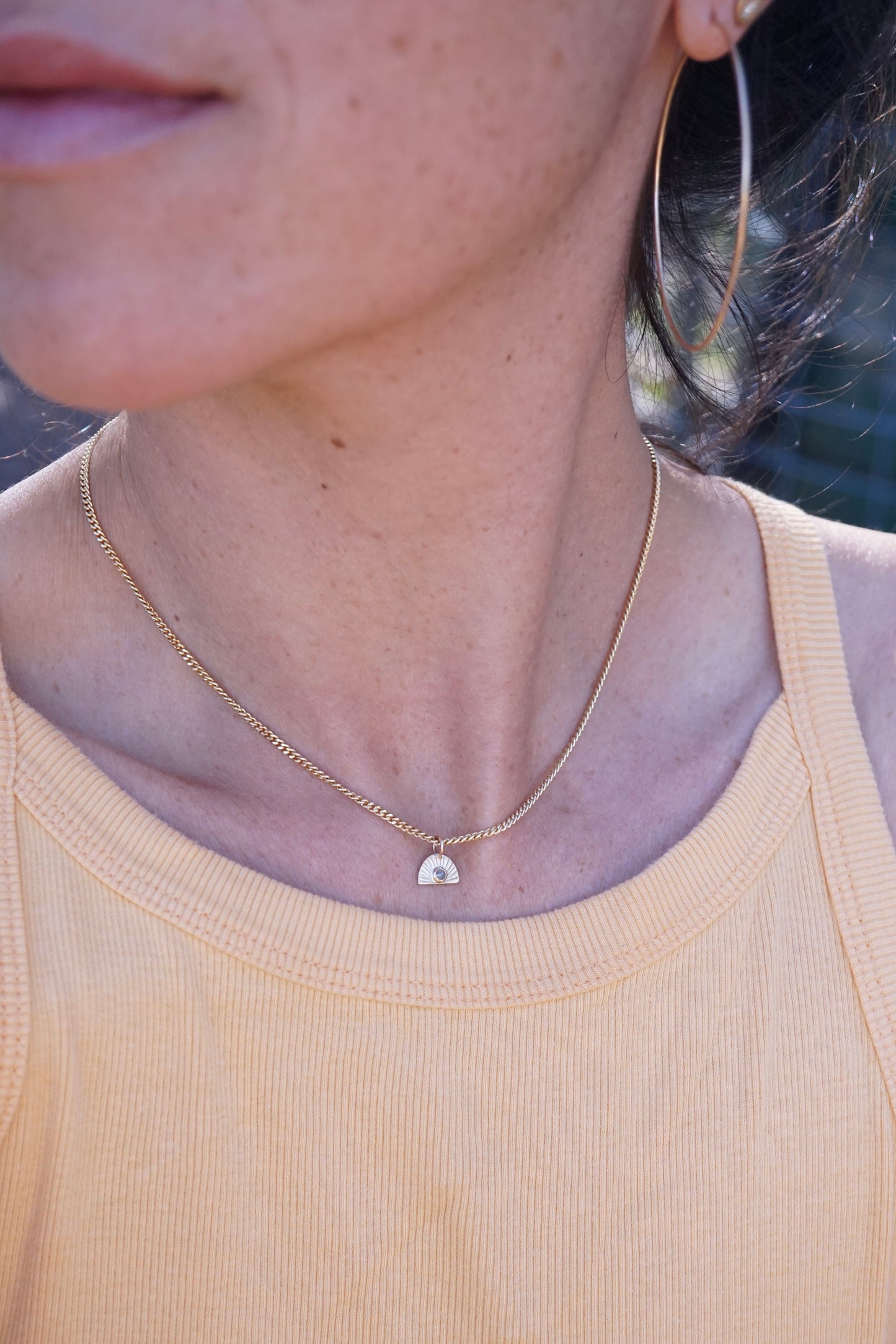 14k golden sunrise necklace with diamond