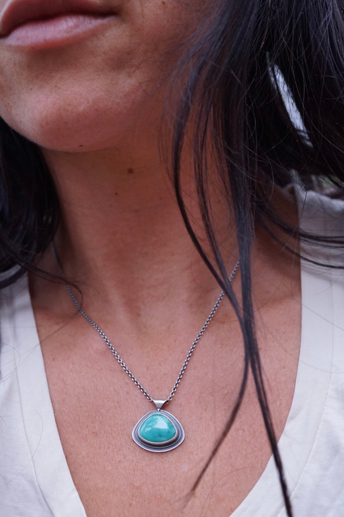 layered silver pendant with Chinese turquoise