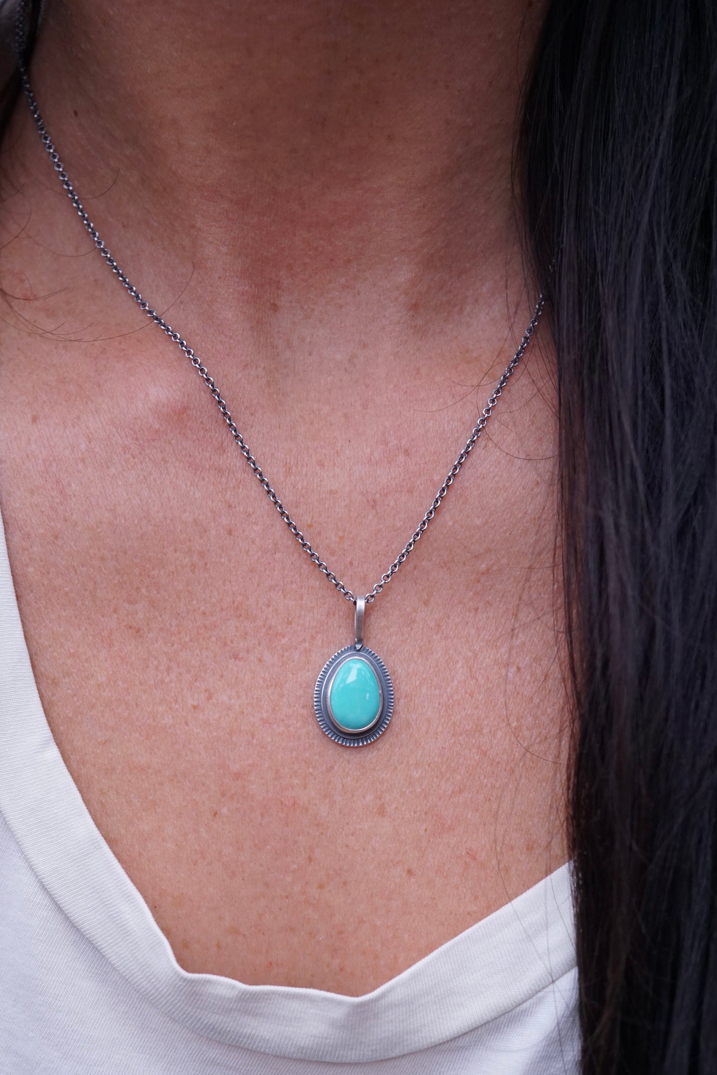 layered silver pendant with chilean turquoise