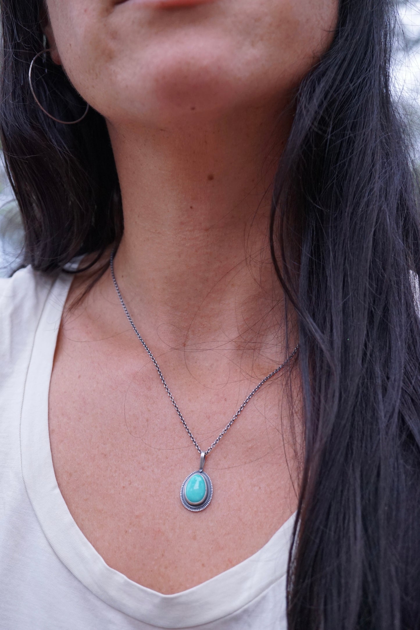 layered silver pendant with chilean turquoise