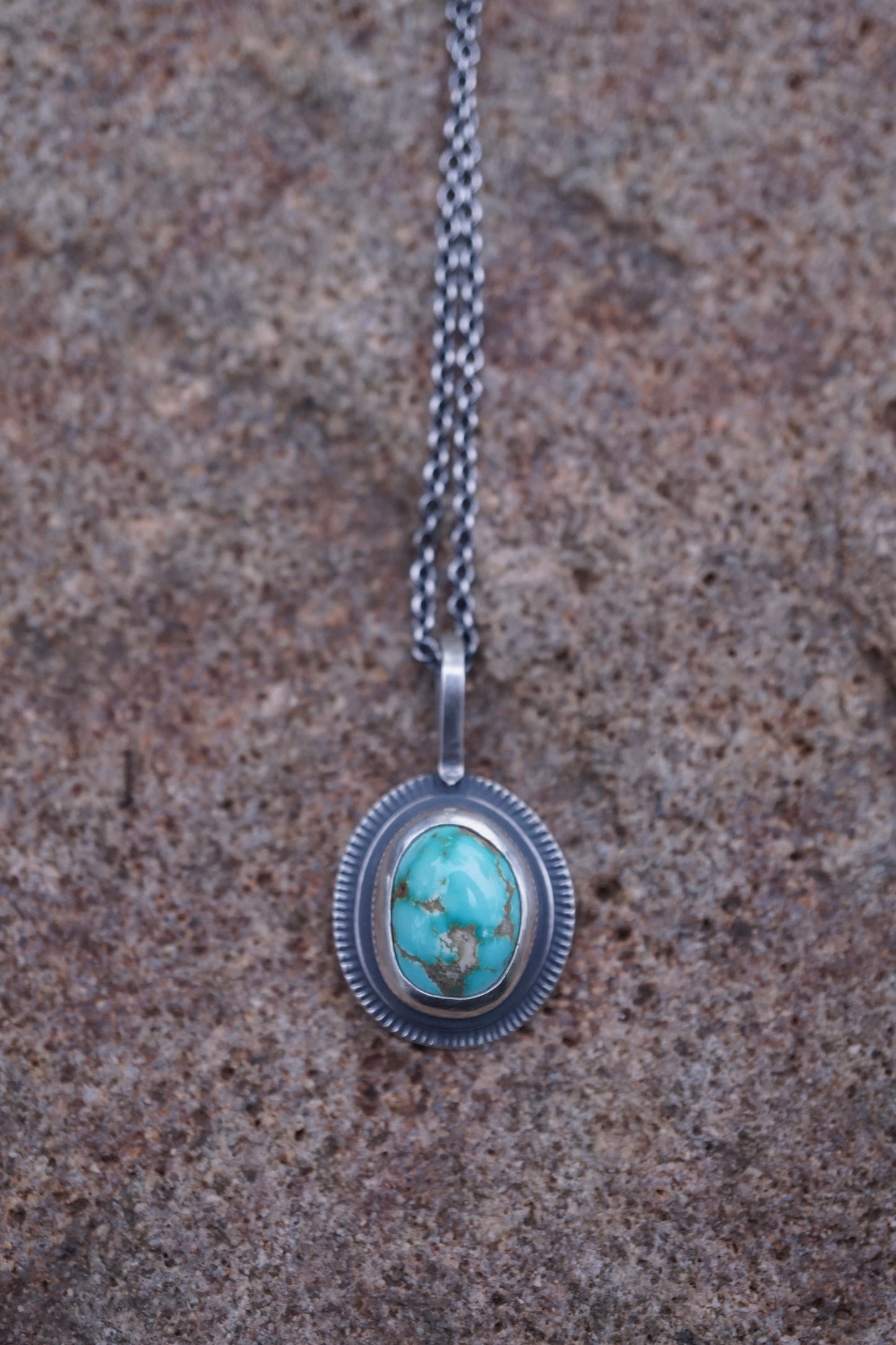 layered silver pendant with cheyenne turquoise