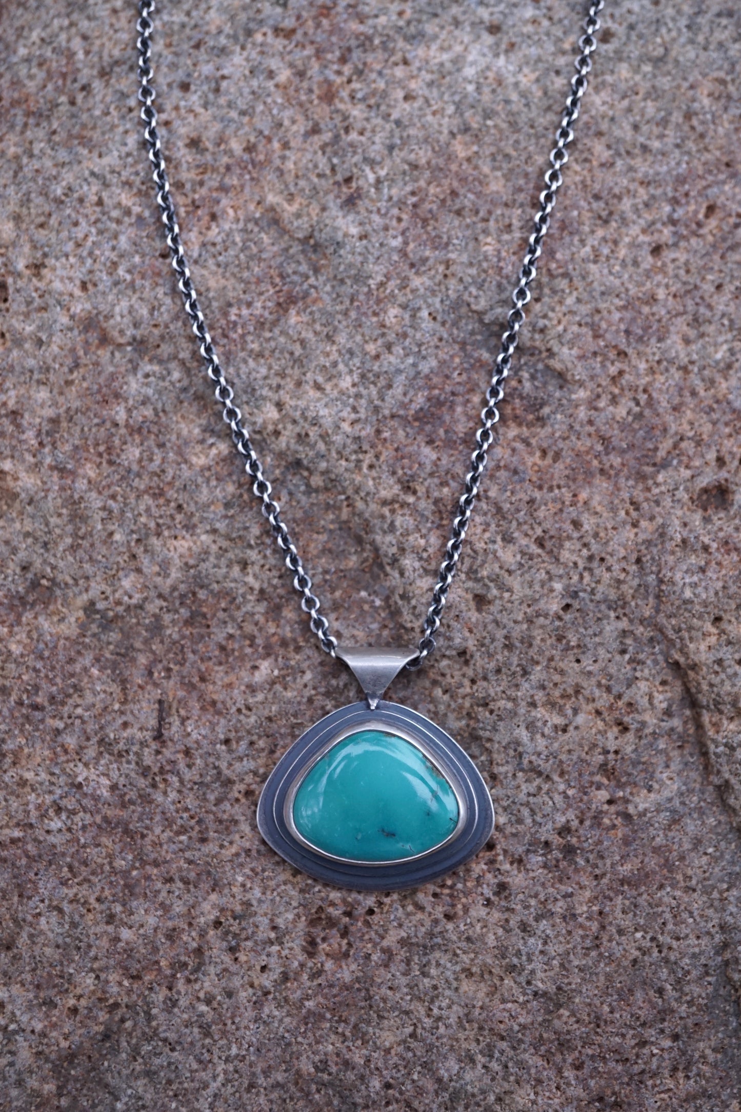 layered silver pendant with Chinese turquoise