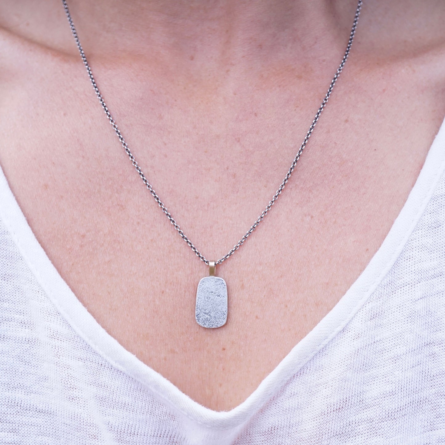 just a silver pendant with a little 14k gold - Lumenrose