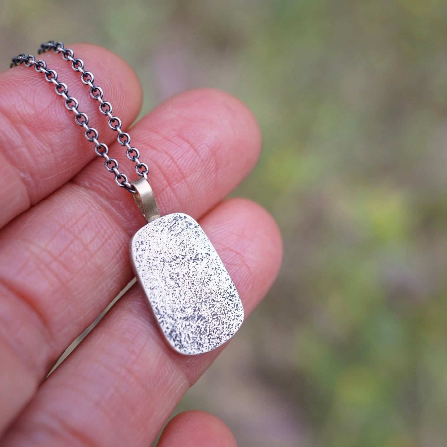 just a silver pendant with a little 14k gold - Lumenrose
