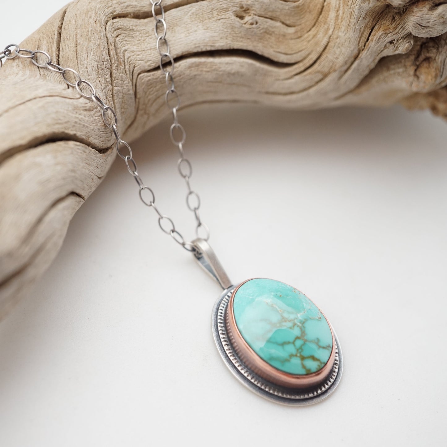 oval carico lake turquoise necklace with copper bezel - Lumenrose