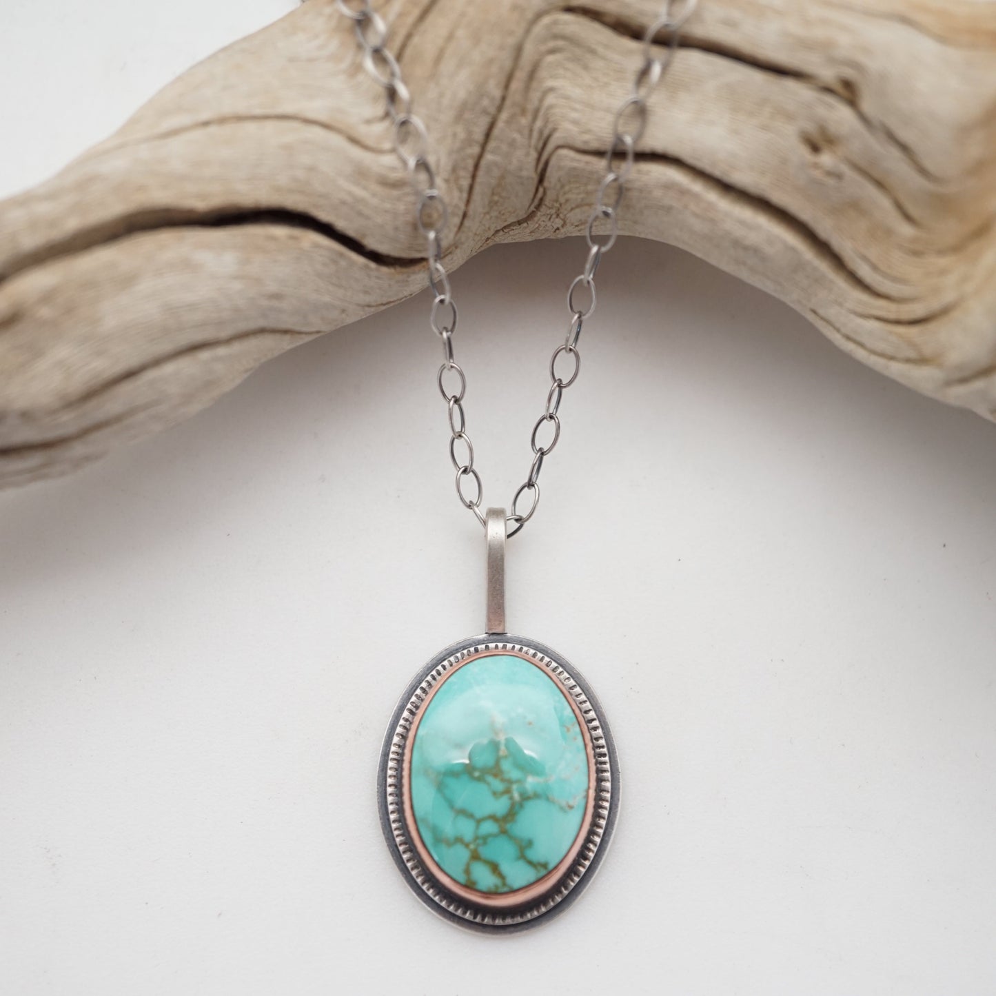 oval carico lake turquoise necklace with copper bezel - Lumenrose