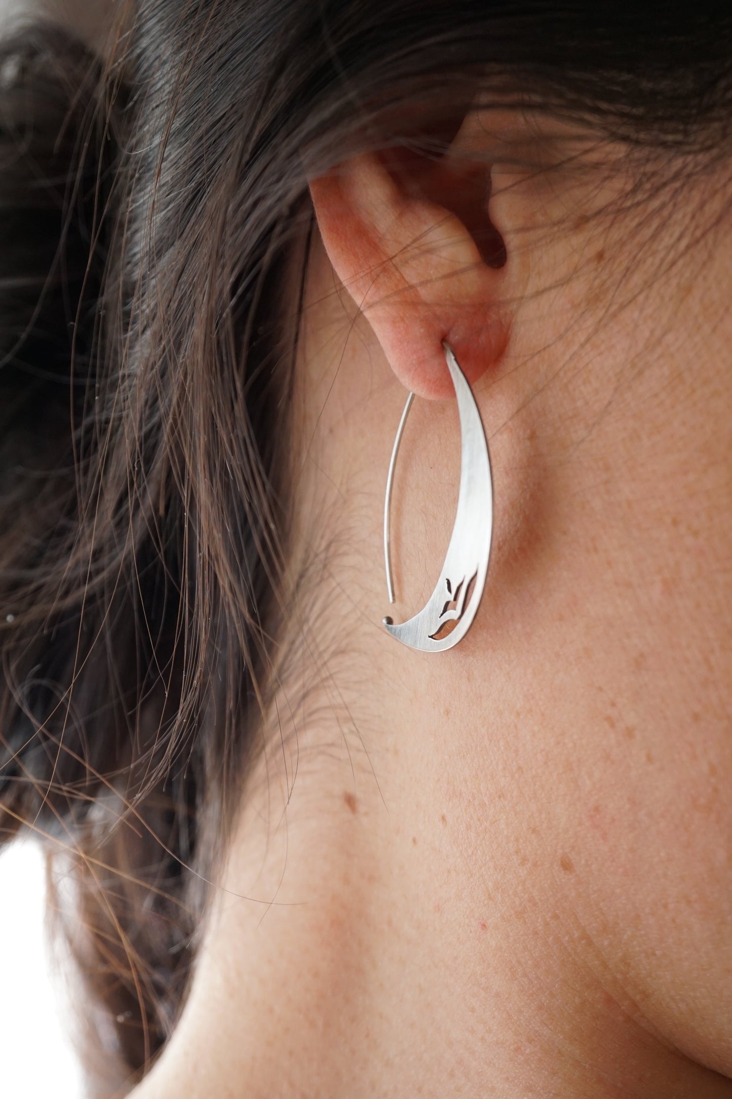 silver crescent earrings with floral motif - Lumenrose