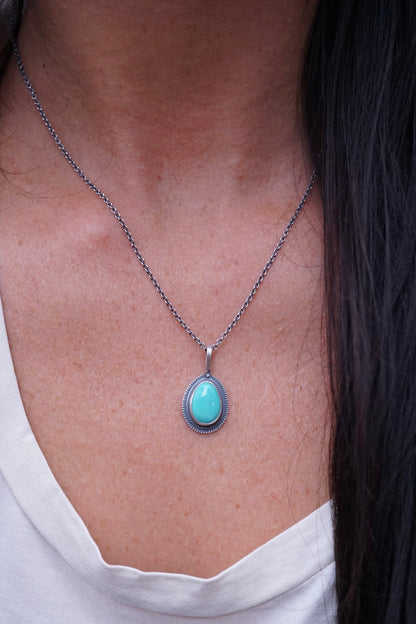 layered silver pendant with chilean turquoise