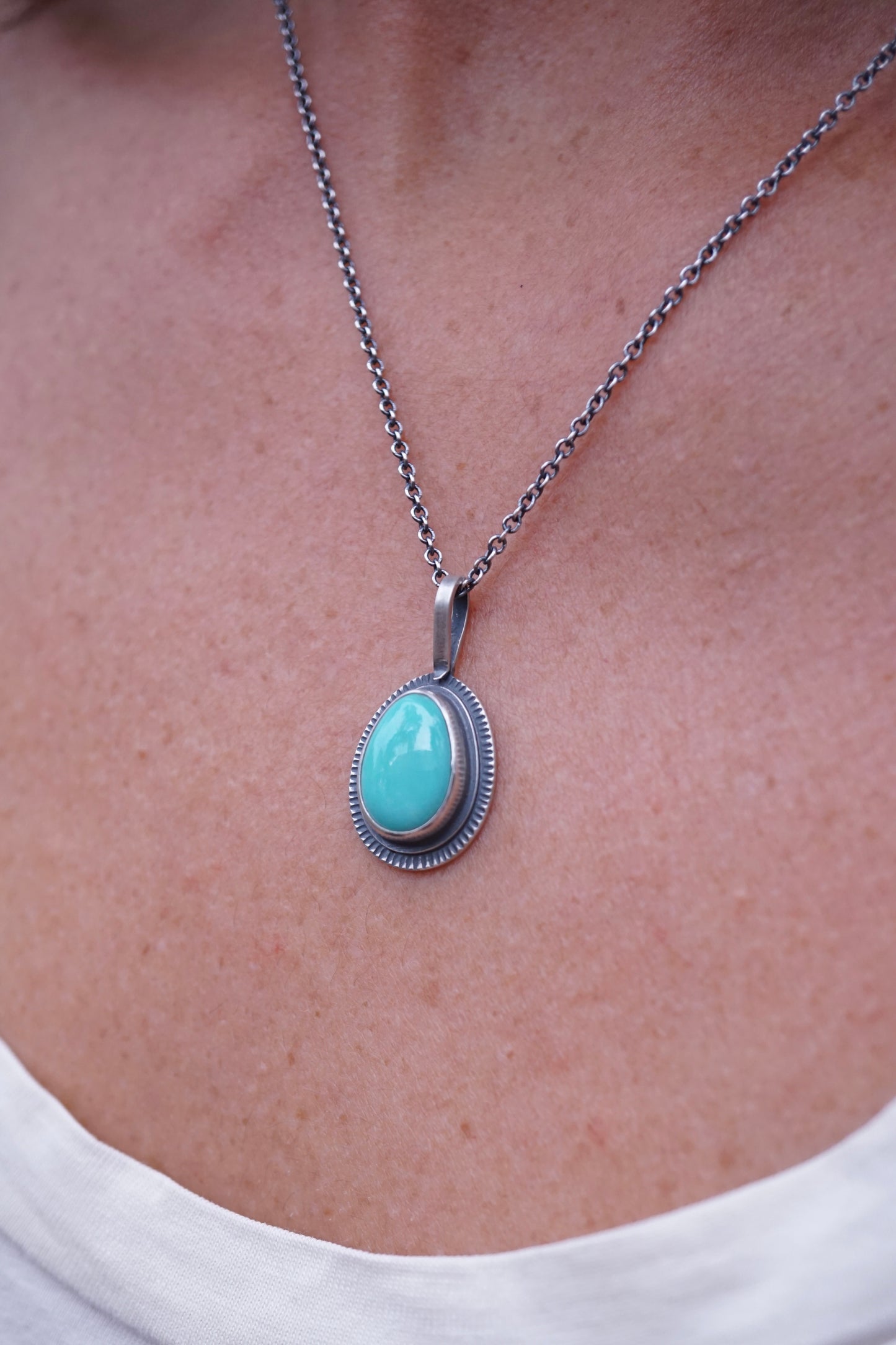 layered silver pendant with chilean turquoise