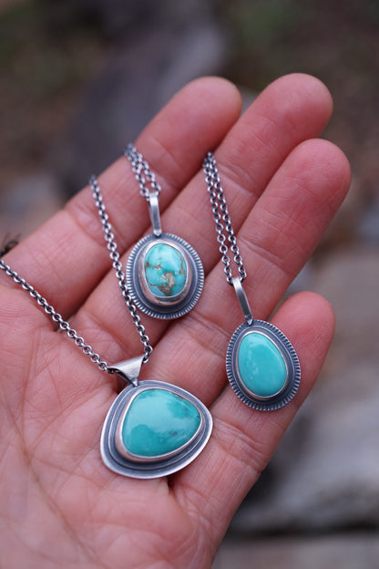 layered silver pendant with Chinese turquoise