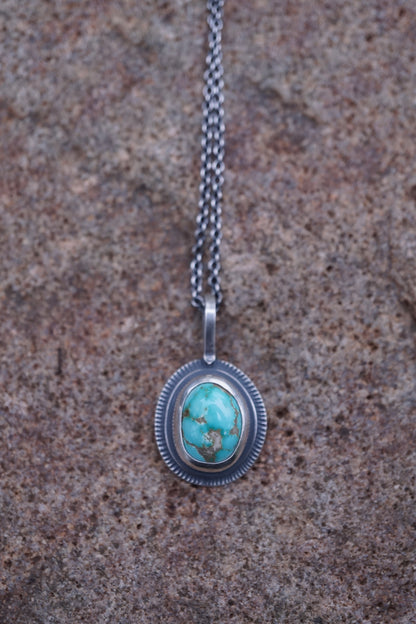 layered silver pendant with cheyenne turquoise