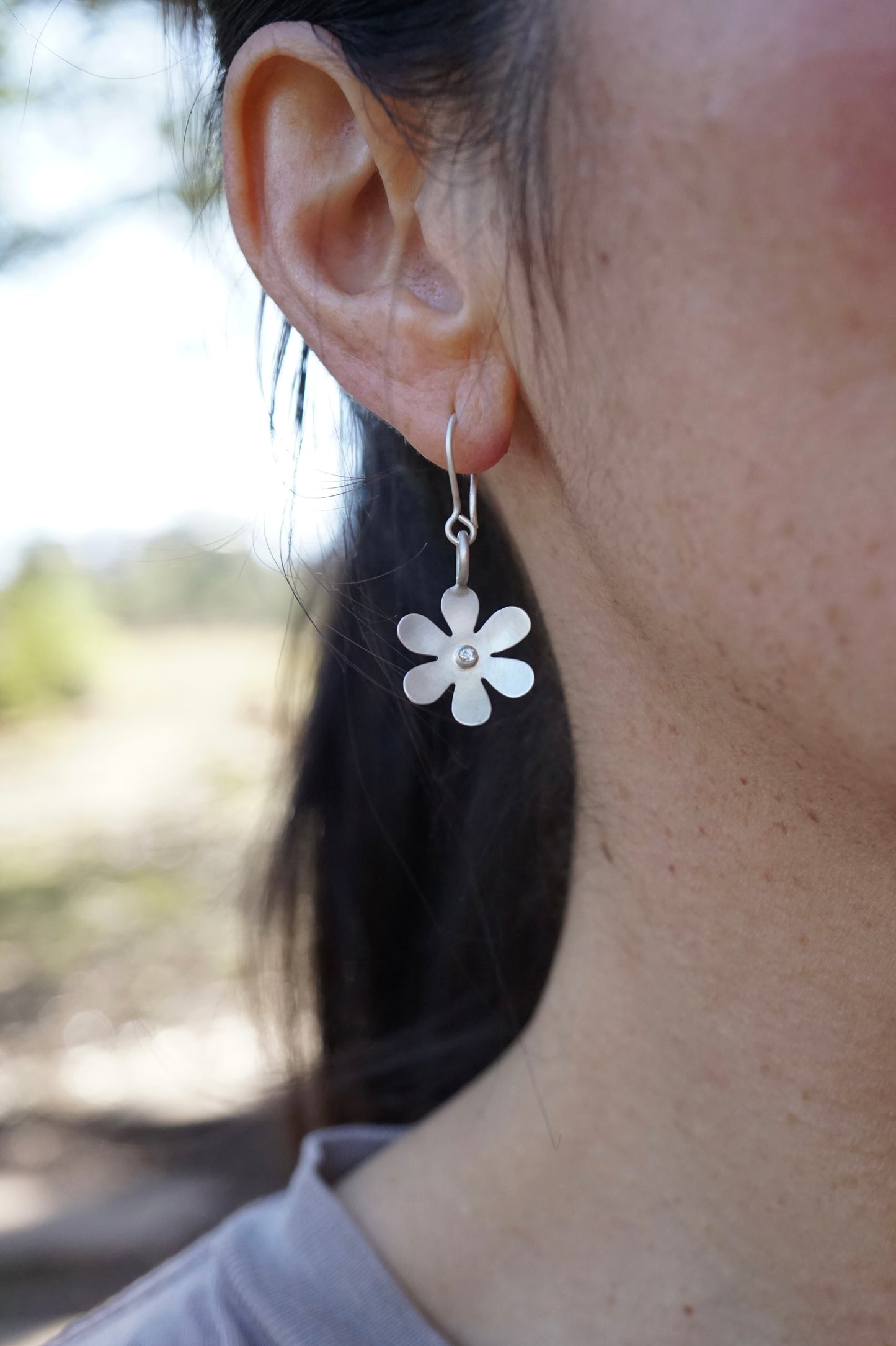 silver retro flower dangles with white sapphires