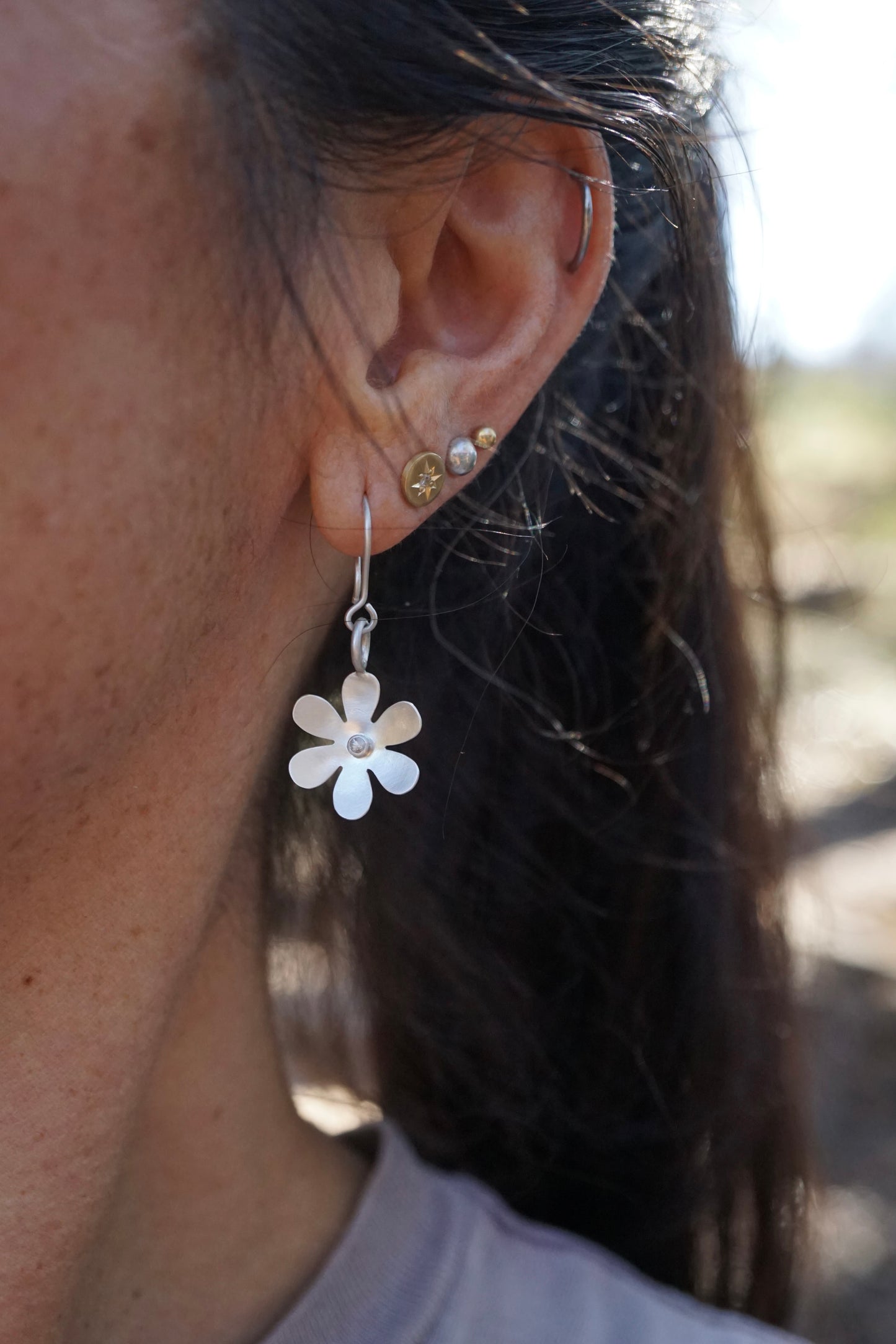 silver retro flower dangles with white sapphires