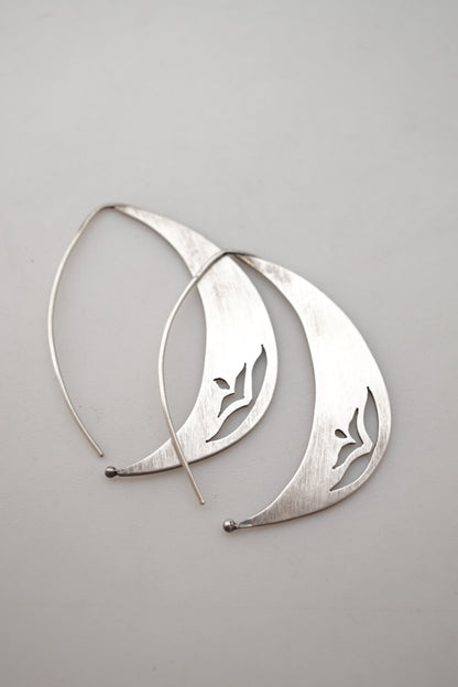 silver crescent earrings with floral motif - Lumenrose